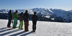 Skiers checking out the Guide to Solo Ski Holidays
