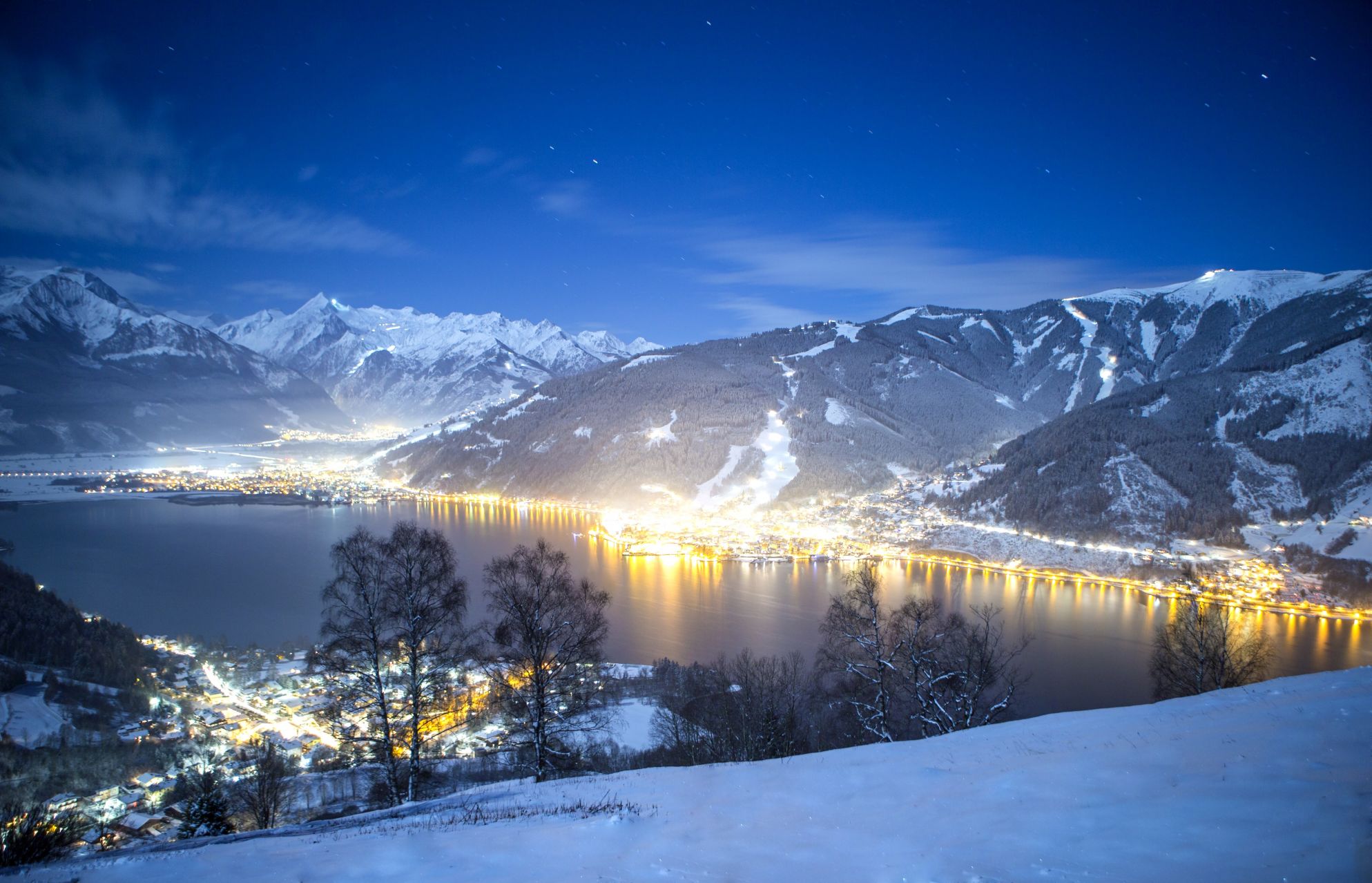A night time view of the lake with Zell Am See resort
