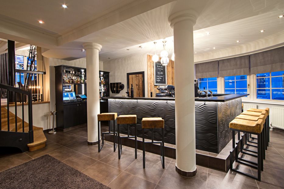 A view of the indoor bar at Hotel Heitzmann