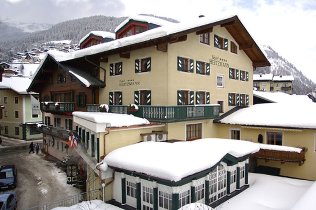 Exterior view of Hotel Heitzmann in the snow