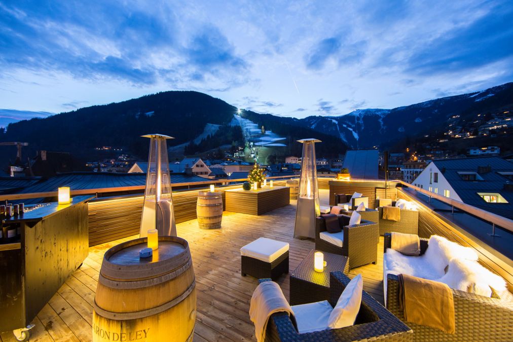 A panoramic view from Hotel Heitzmann rooftop bar in the winter with snow on the mountains