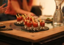 Solo Travelers Over 40s sharing dinner