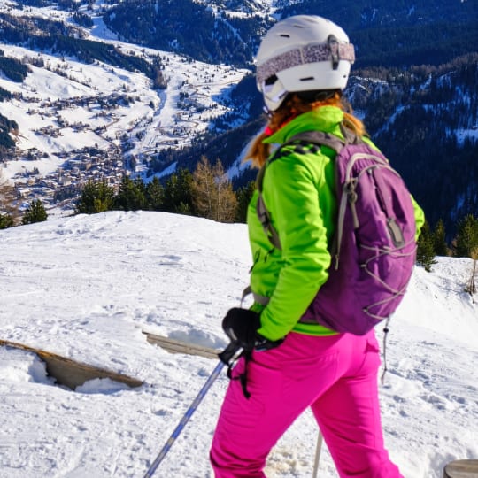 Solo skier above Corvara resort - Italy