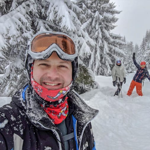 Solo skiers having fun in fresh snow