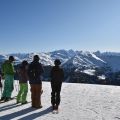 Skiers checking out the Solo Ski Holidays guide