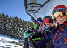 Skiers on lift during a Short Break