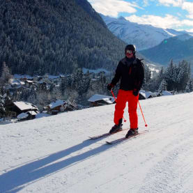 Beginners skier on flat run