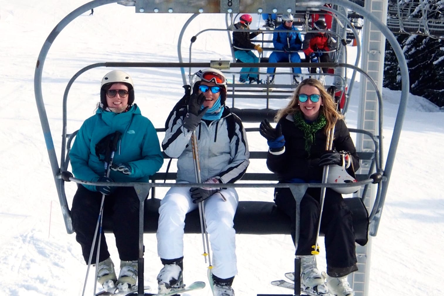 Skiers on chairlift