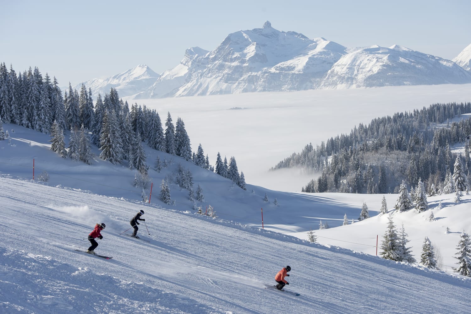 Three Skiers in Les Gets